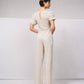 Tuta lunga a gamba larga con scollo a V e cut-out