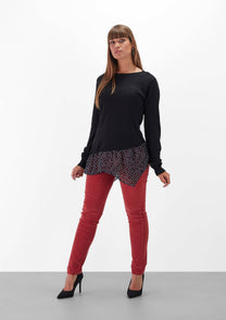 Maglia nera con balza a pois