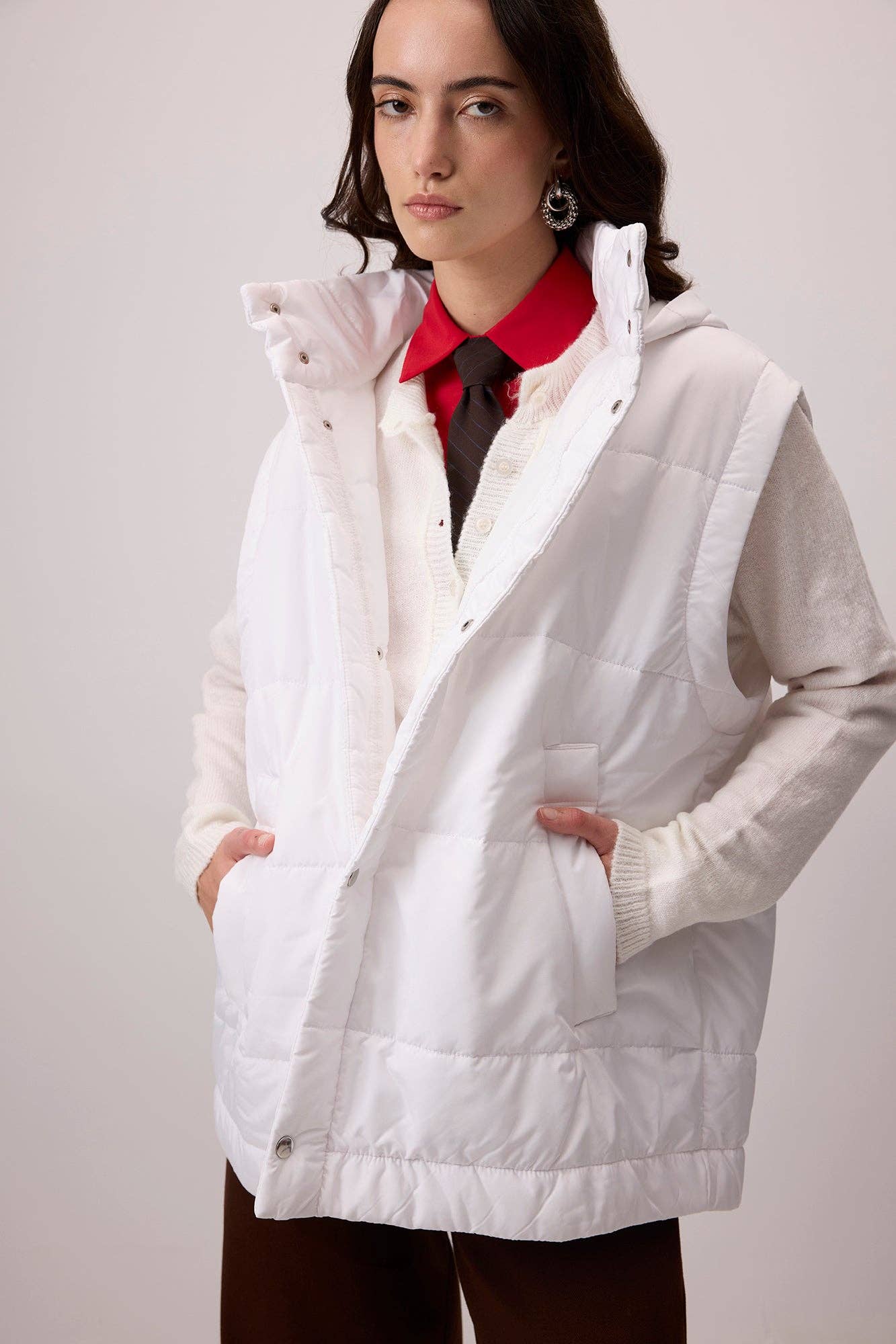 Gilet imbottito con cappuccio