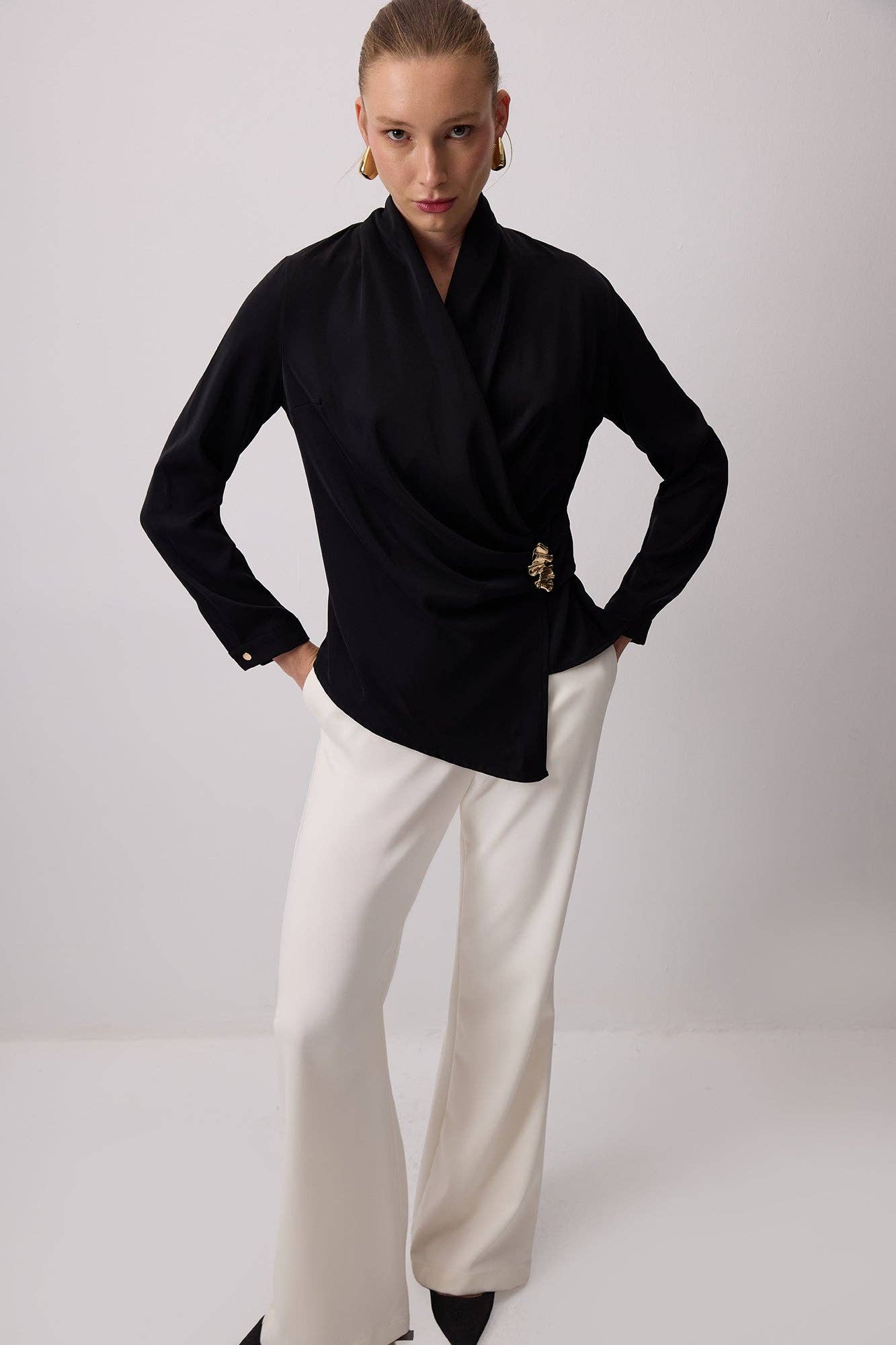 Blusa drappeggiata elegante