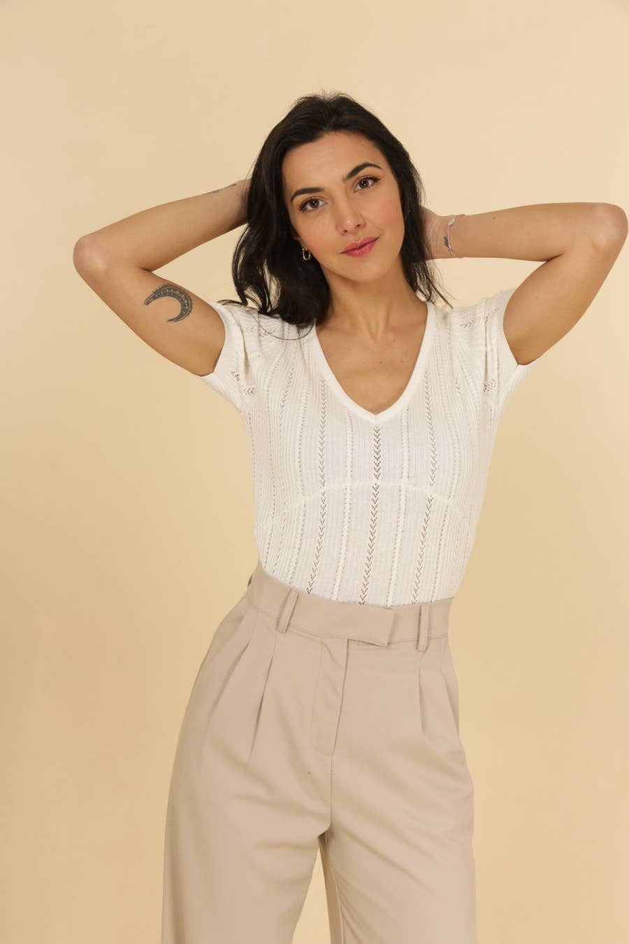 Top in maglia traforata con scollo a V Maki