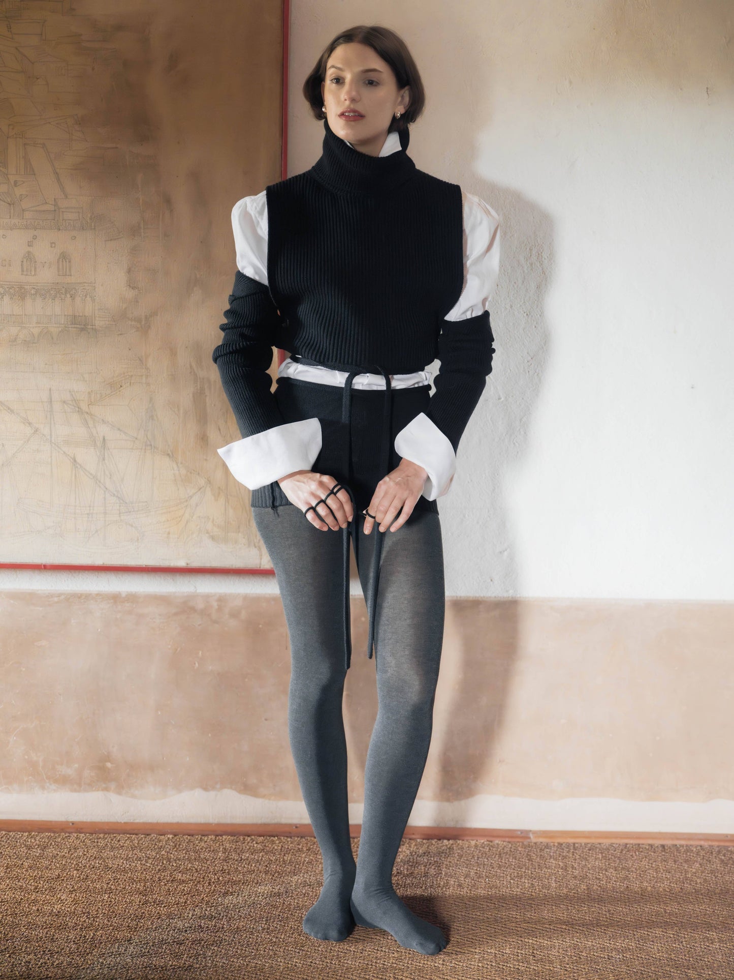 Scaldabraccia in lana merino extra fine con fasce lunghe