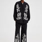 Bomber oversize nero ricamato con motivo floreale