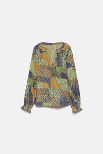 Blusa patchwork multicolor con scollo a V
