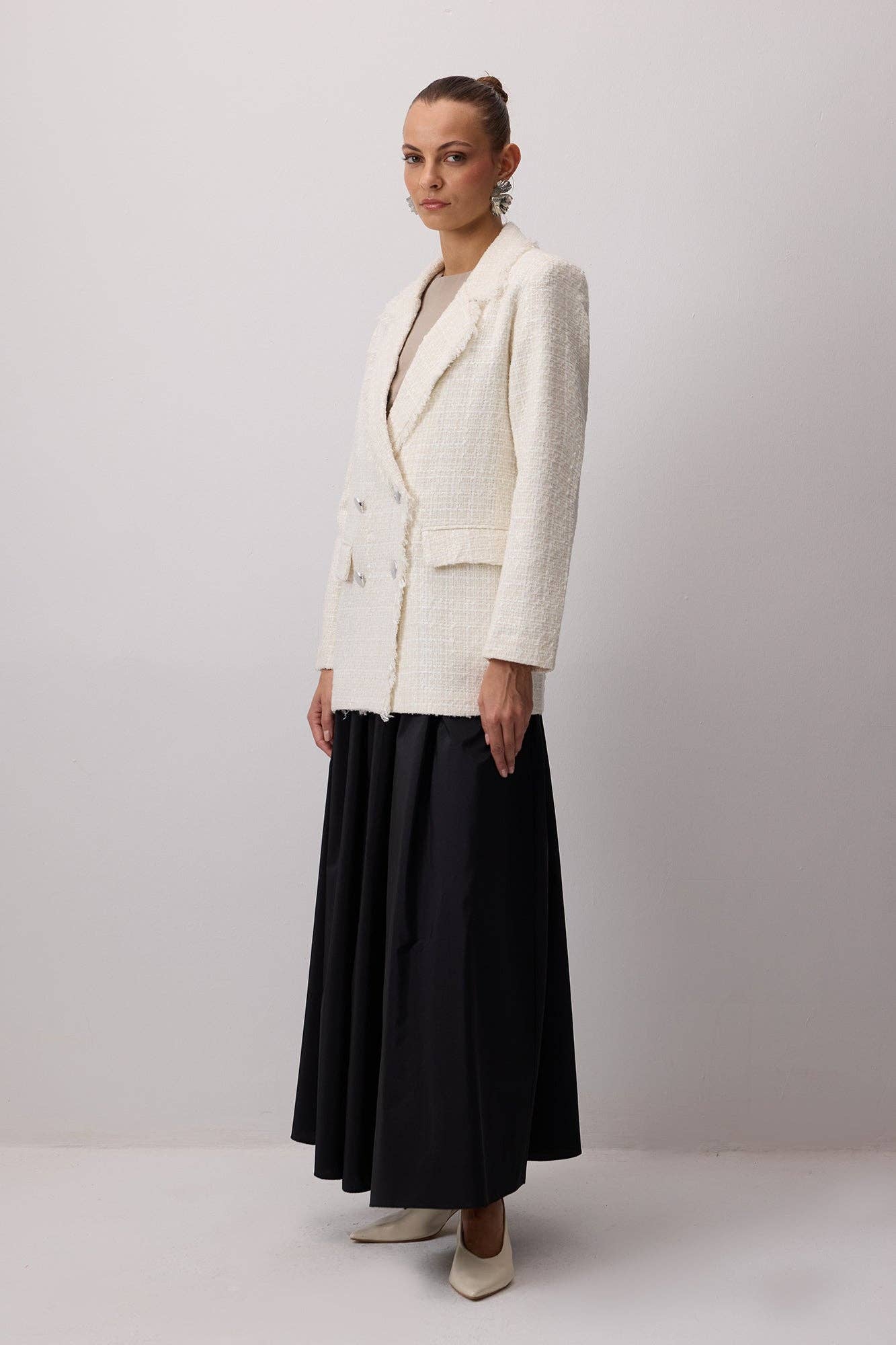 Giacca in tweed con frange