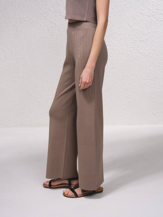Pantaloni in maglia a gamba ampia con applicazioni glitter