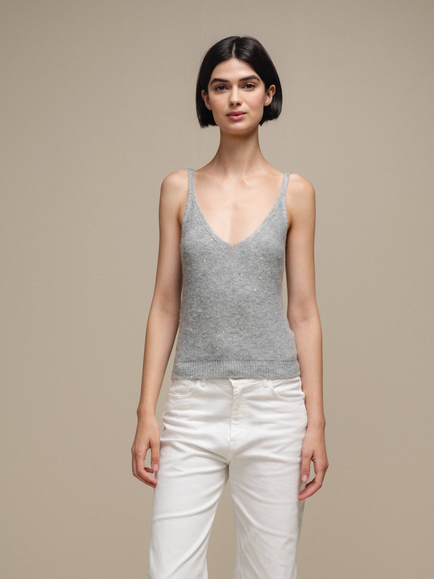 Canotta in maglia lurex versatile con scollo a V