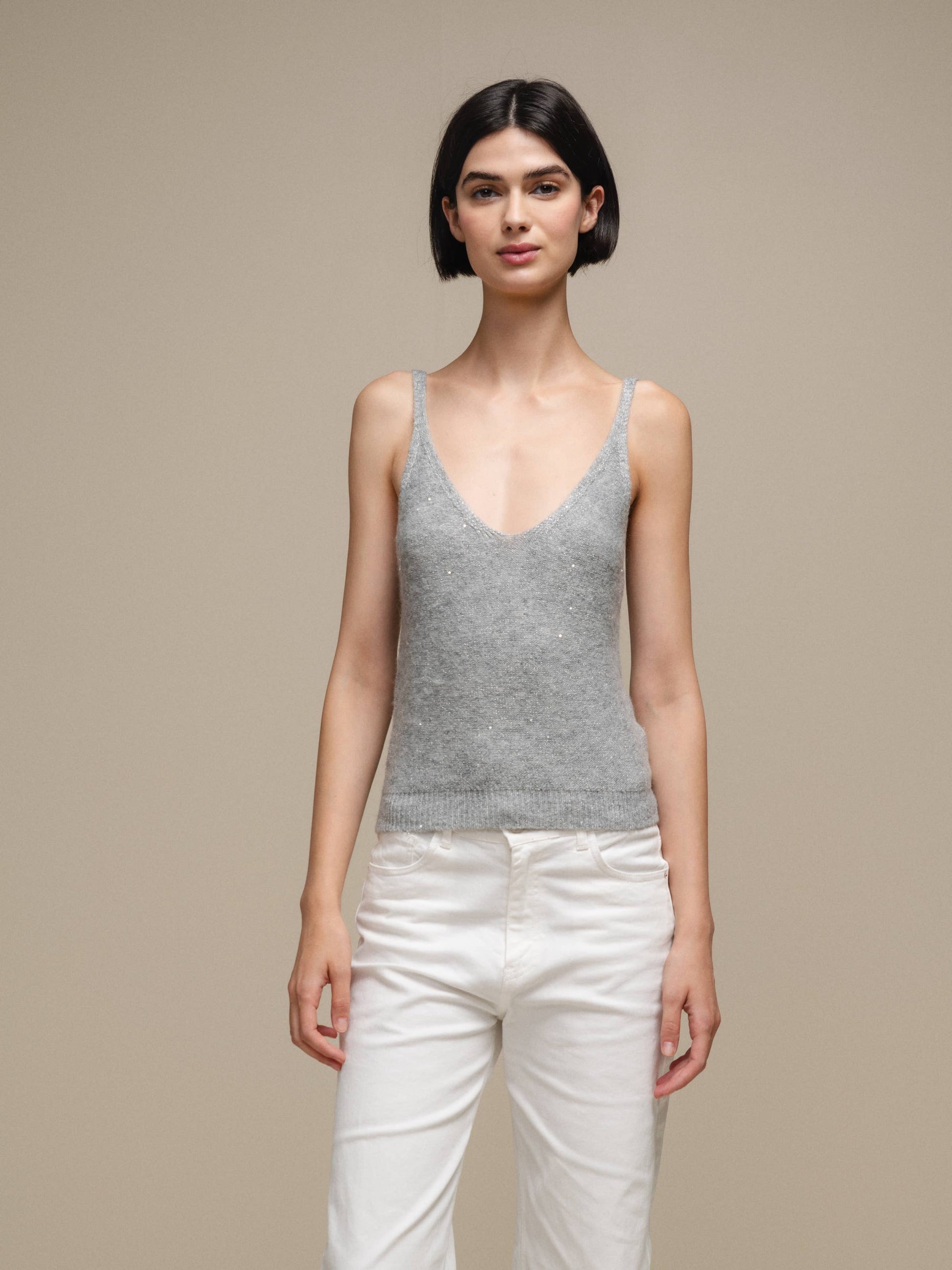 Canotta in maglia lurex versatile con scollo a V