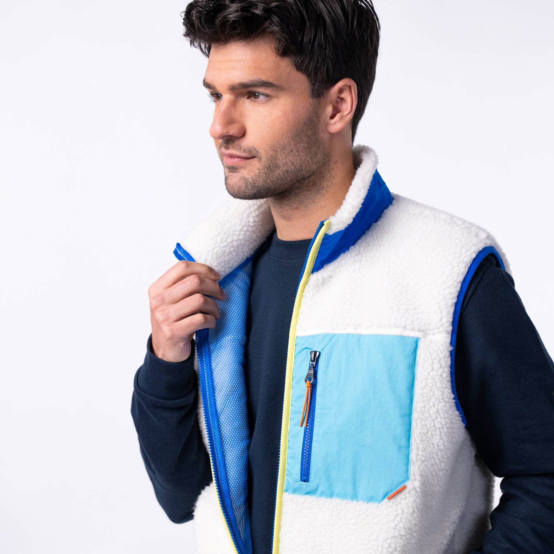 Gilet sherpa unisex avorio e blu con zip