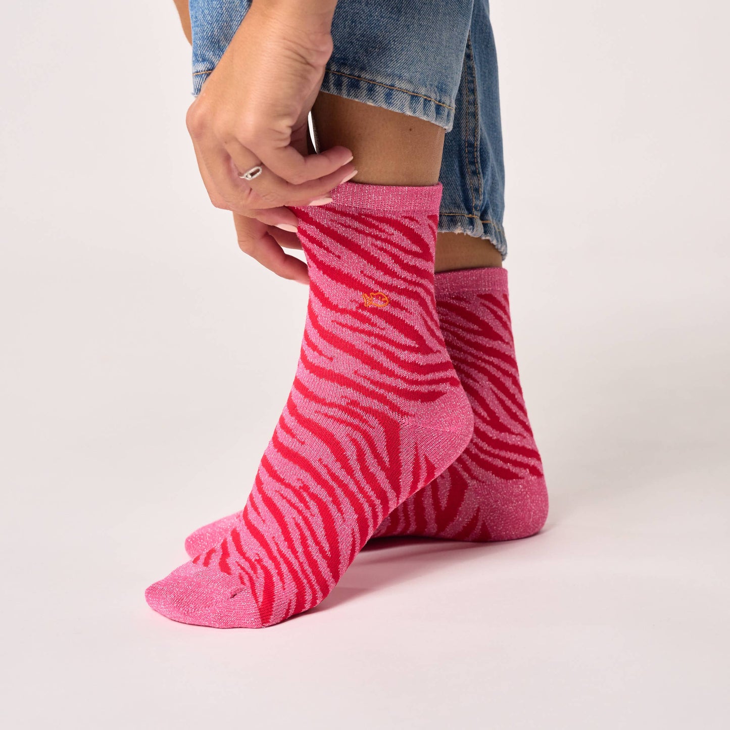 Calzini glitterati zebrati in cotone pettinato rosa e rosso