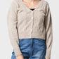 Cardigan in maglia a trecce con bottoni