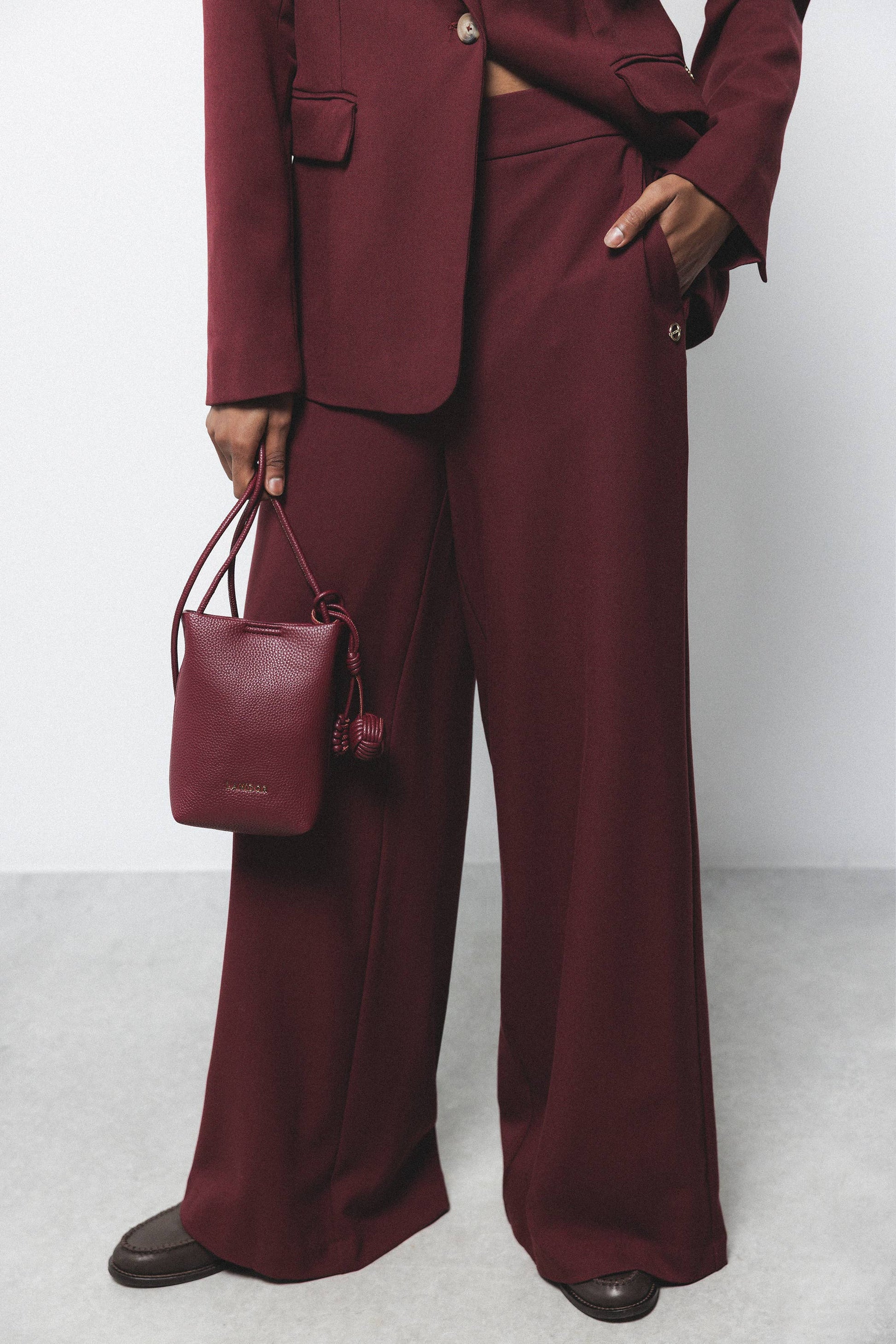 Pantaloni palazzo a gamba larga con zip laterale
