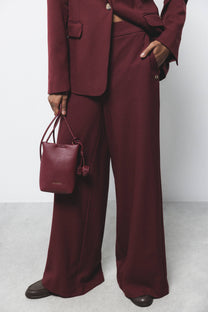 Pantaloni palazzo a gamba larga con zip laterale