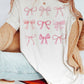 T-shirt grafica con fiocchi rosa