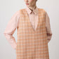 Abito pinafore in tweed a quadri con scollo a V