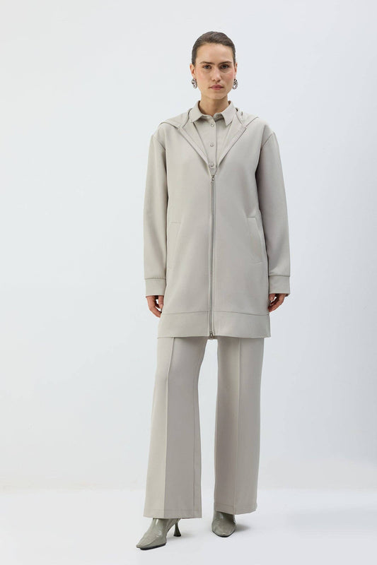 Giacca lunga con cappuccio e zip