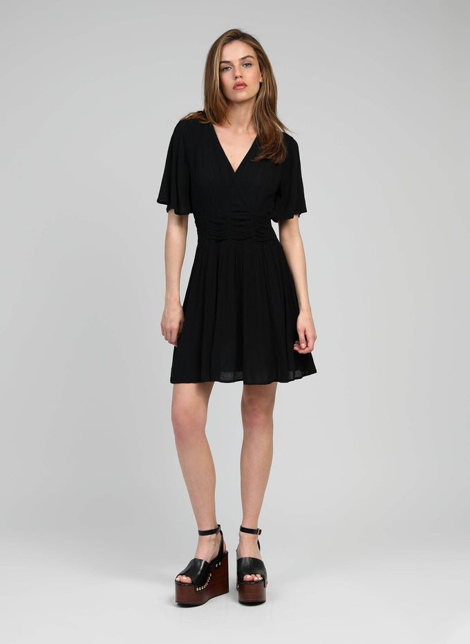 Vestito corto nero con scollo a V
