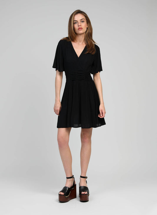 Vestito corto nero con scollo a V