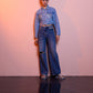 Jeans a vita alta wide leg con strass e strappi