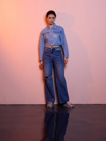 Jeans a vita alta wide leg con strass e strappi