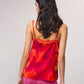 Top stampato con pizzo e scollo a V