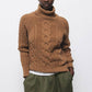 Maglione dolcevita a trecce in lana