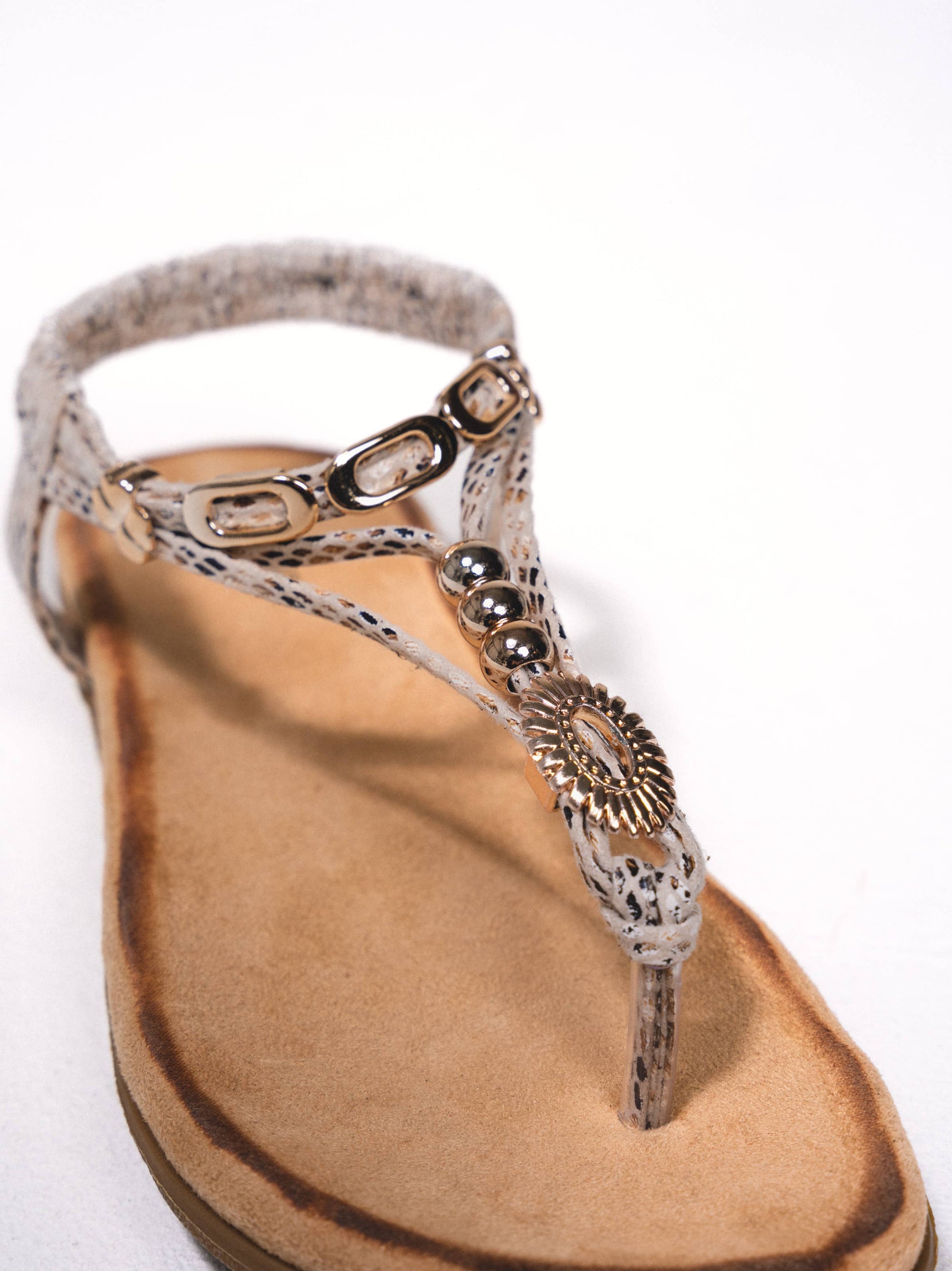 Sandali flat animalier con applicazioni metalliche