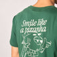 T-shirt in cotone biologico verde con stampa piranha