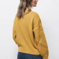 Maglione strutturato in maglia con girocollo