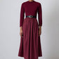Abito midi plissé bordeaux con cintura