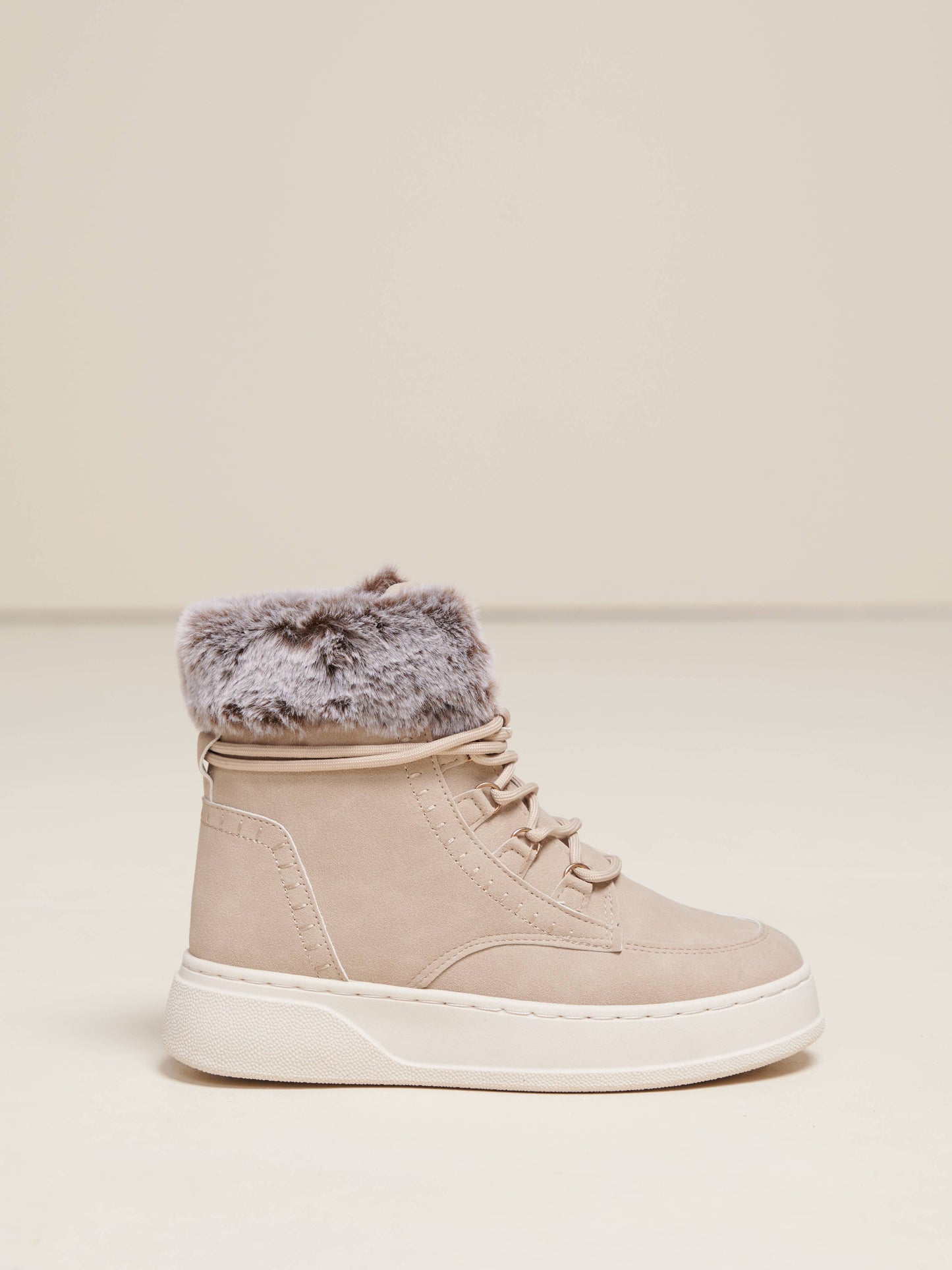 Stivali in eco-pelle con bordo in pelliccia