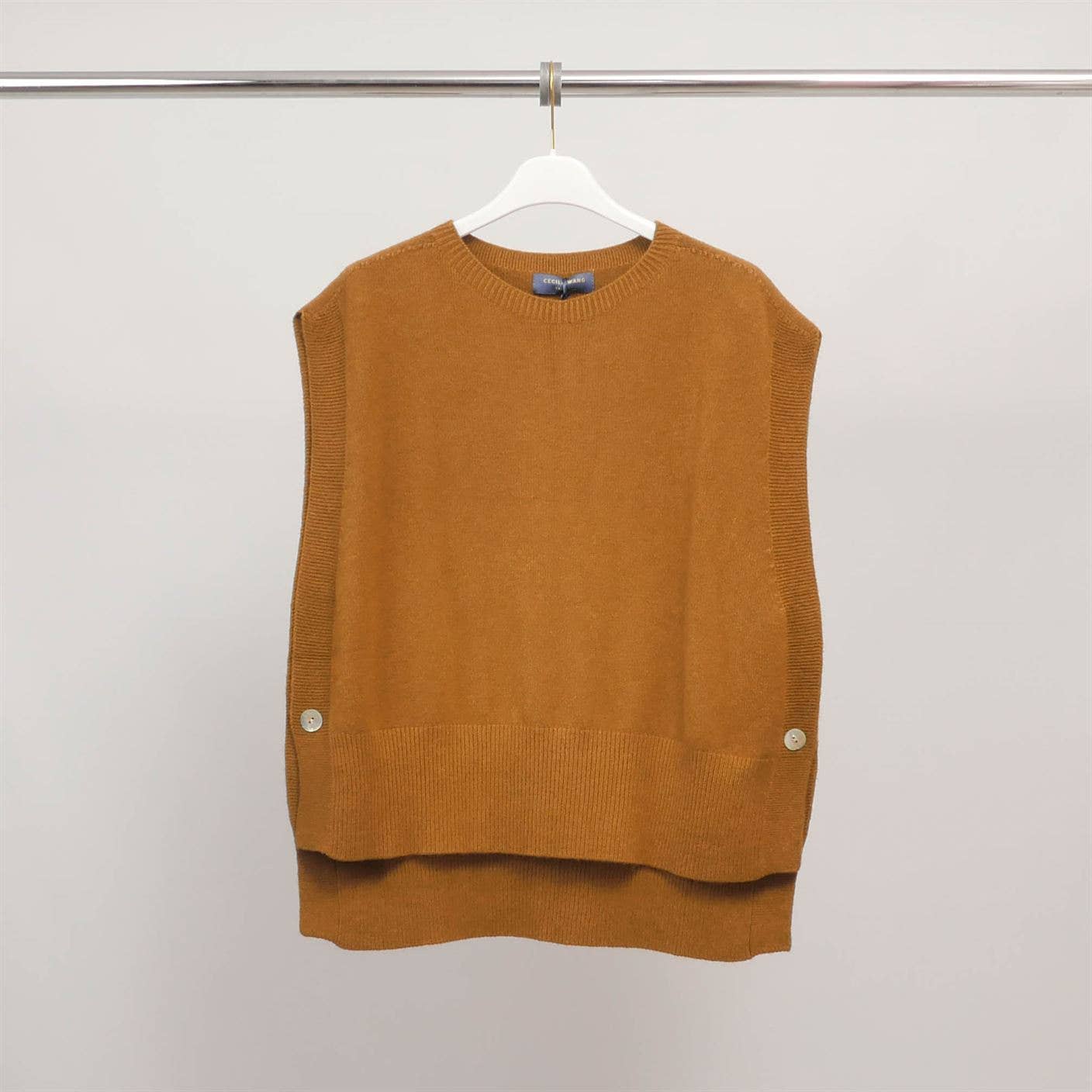 Poncho senza maniche in maglia strutturata con girocollo