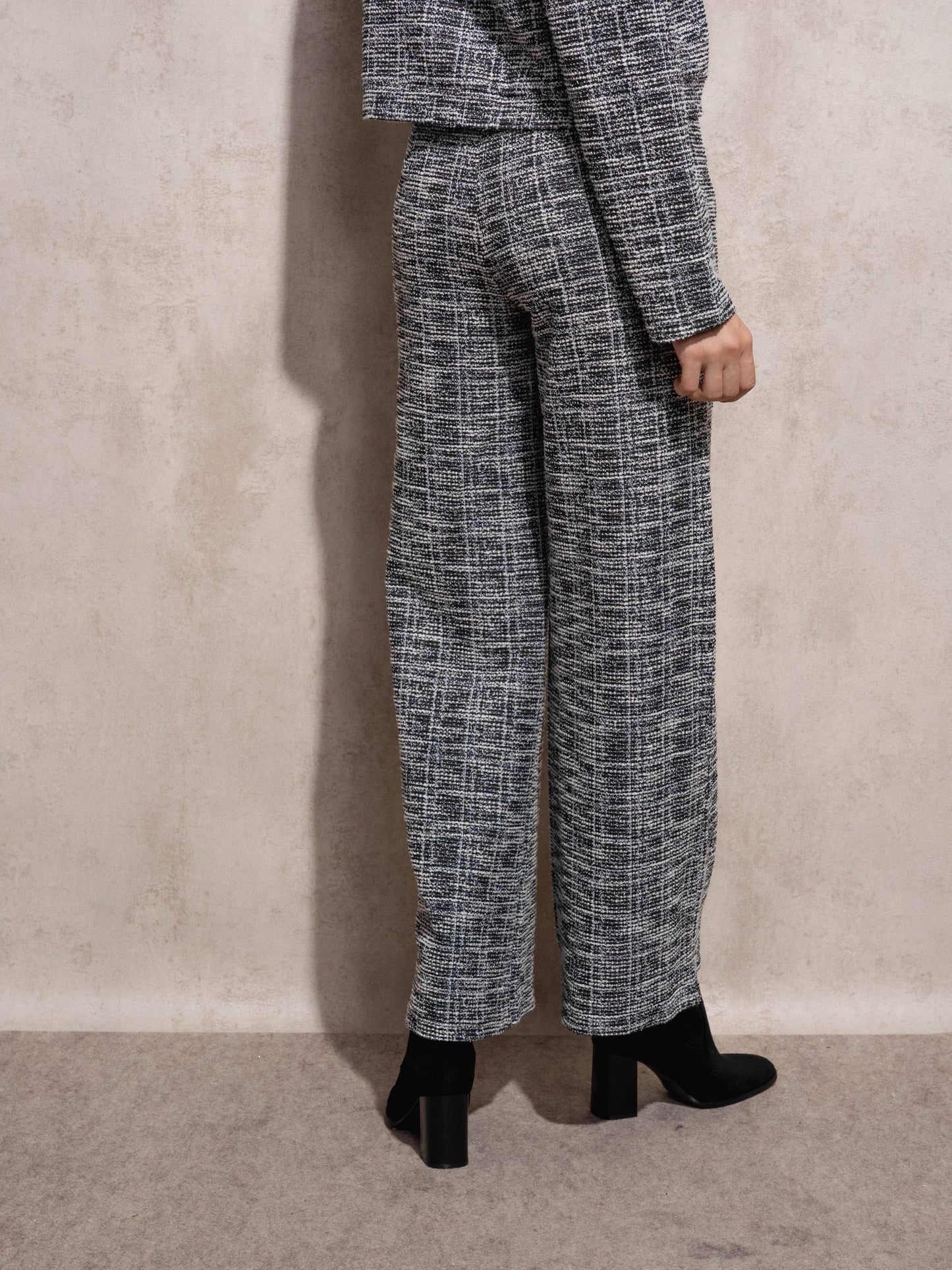 Pantaloni fluidi a gamba ampia con bottoni