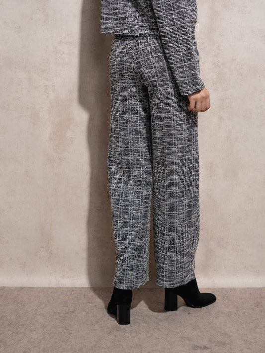Pantaloni fluidi a gamba ampia con bottoni