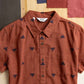 Camicia a maniche corte Lana con motivo piramidi color ruggine