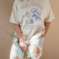 T-shirt oversize grafica “Girl Dinner”