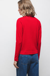 Maglione in maglia rasata con scollo a V e fiocco