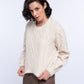 Maglione cropped in maglia a trecce da donna