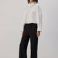 Pantaloni in crêpe con frange