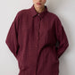 Completo con camicia a quadri e pantaloni bordeaux