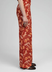 Pantaloni a vita alta terracotta con stampa frecce