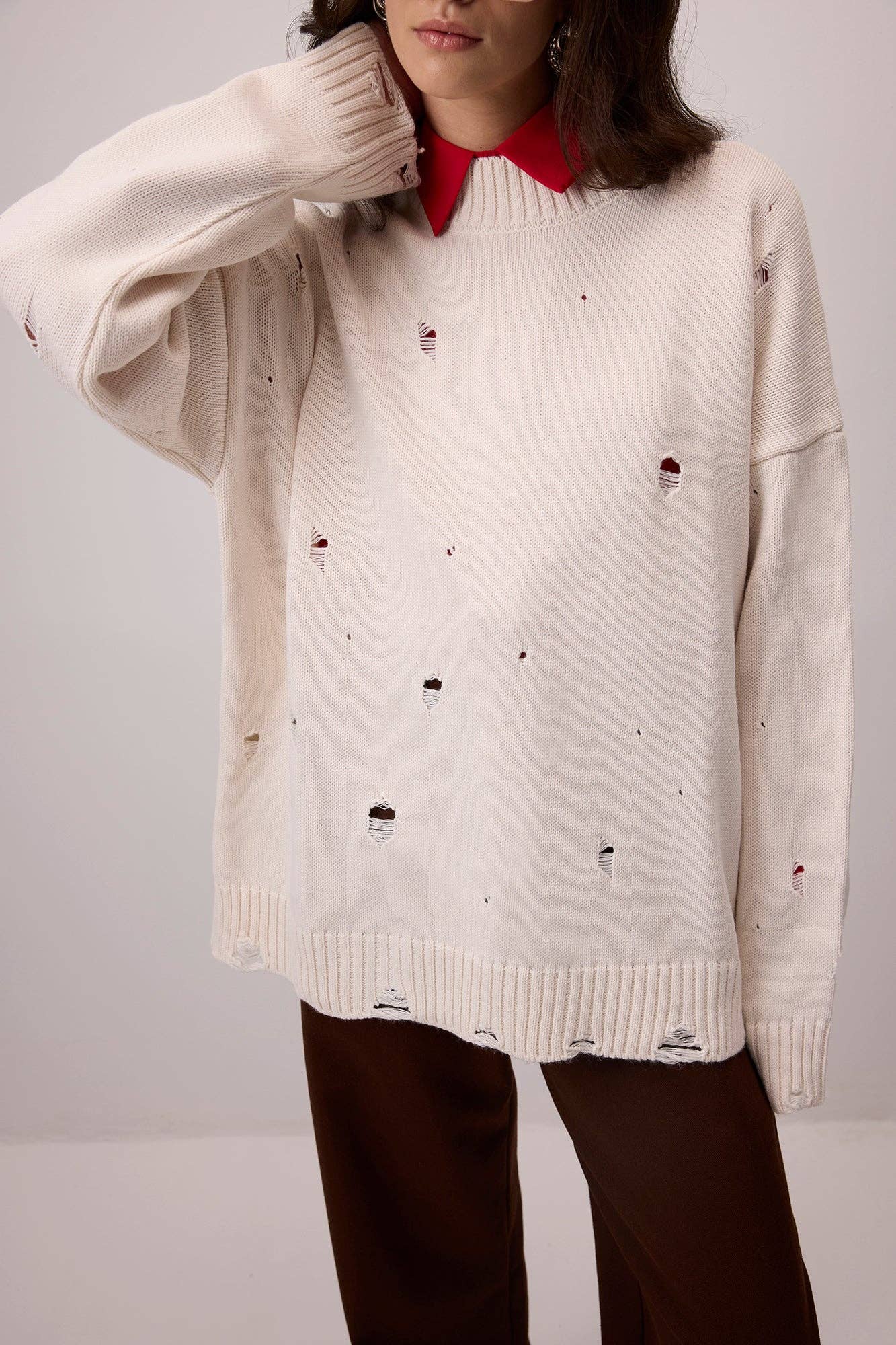 Maglione in maglia effetto vintage con dettagli distressed
