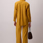 Completo camicia e pantaloni con ricami di pietre