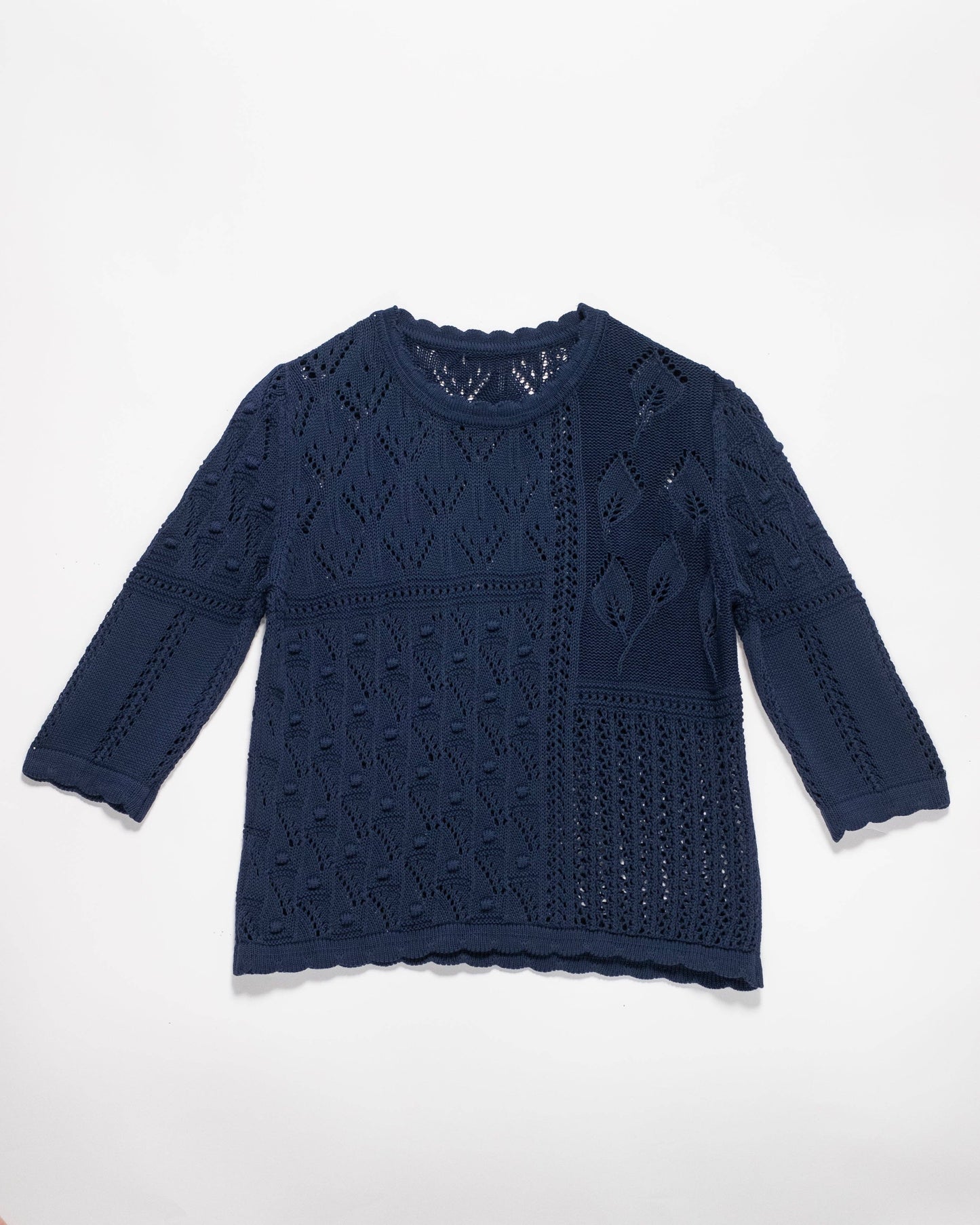 Maglia traforata in cotone con motivo floreale
