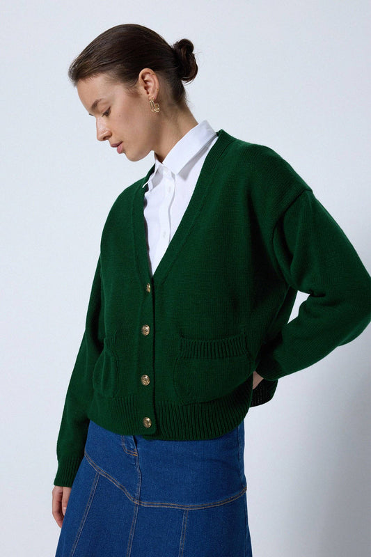 Cardigan in maglia verde con tasche e bottoni