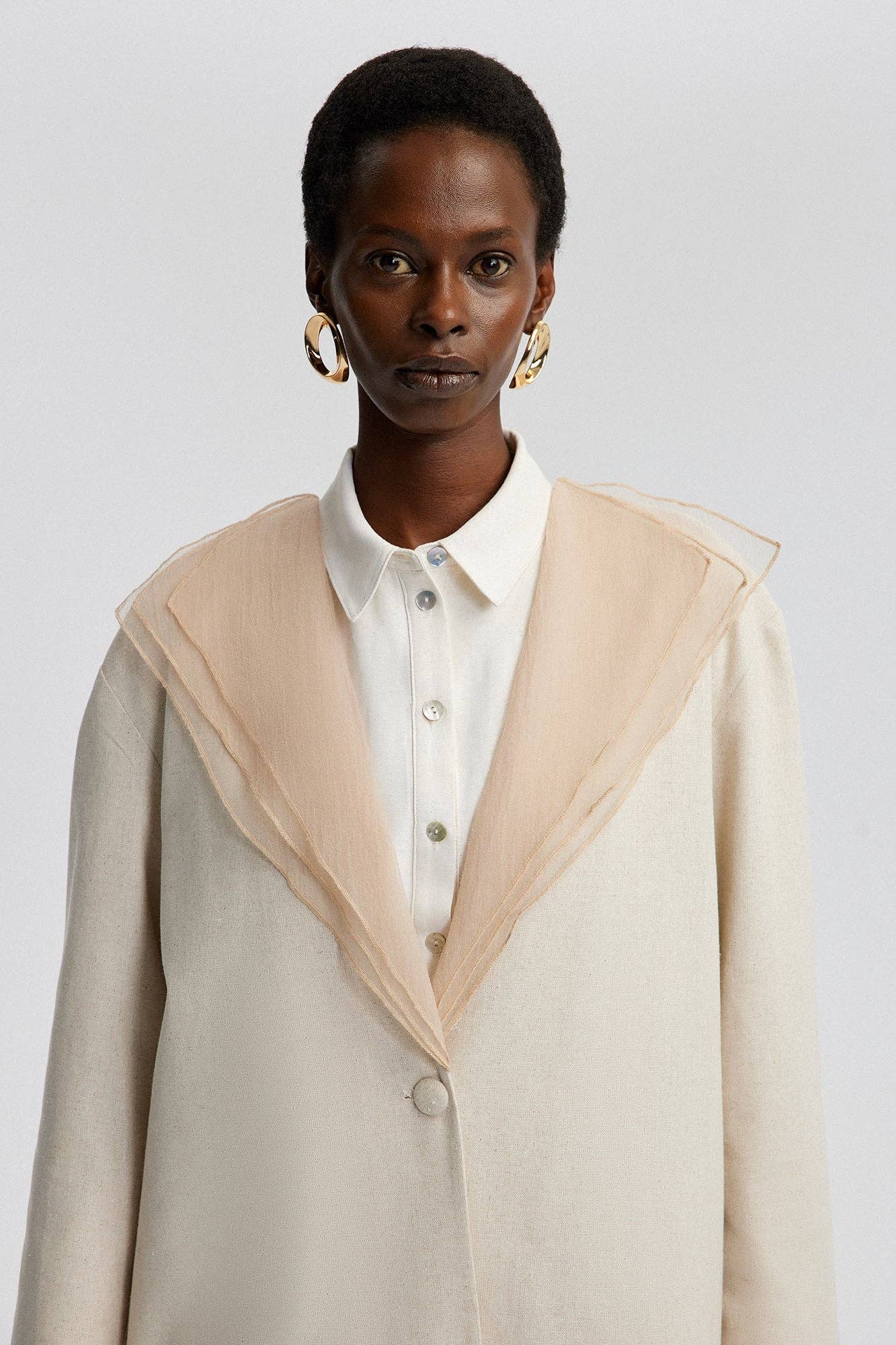 Giacca in lino con colletto in organza