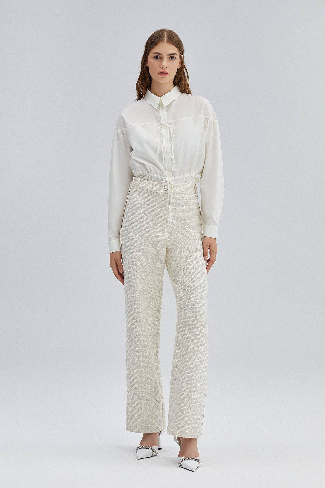 Pantaloni in tweed a vita alta color crema