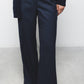 Pantaloni dritti essenziali con tasche oblique