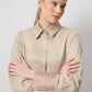 Camicia beige con polsini in organza