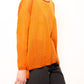 Pullover glitter con scollo a barca